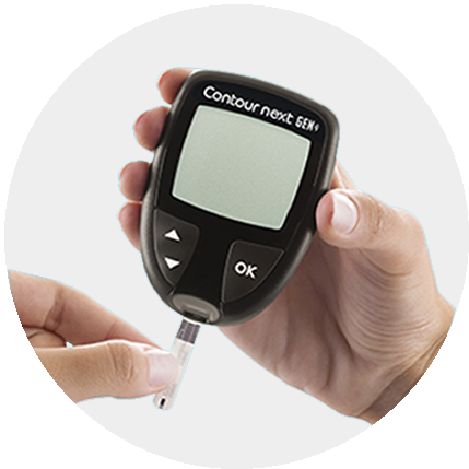 user inserting a strip in a meter